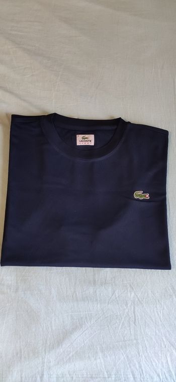 Polo homme taille 5 L Lacoste neuf