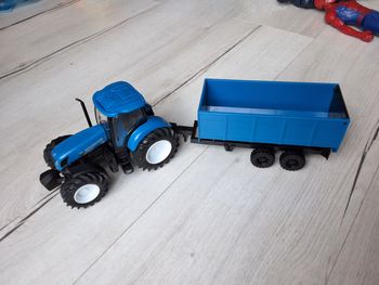 Jeu jouet véhicule ferme tracteur bleu avec sa remorque