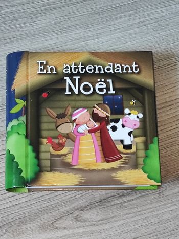 Livre en attendant Noël 
Neuf