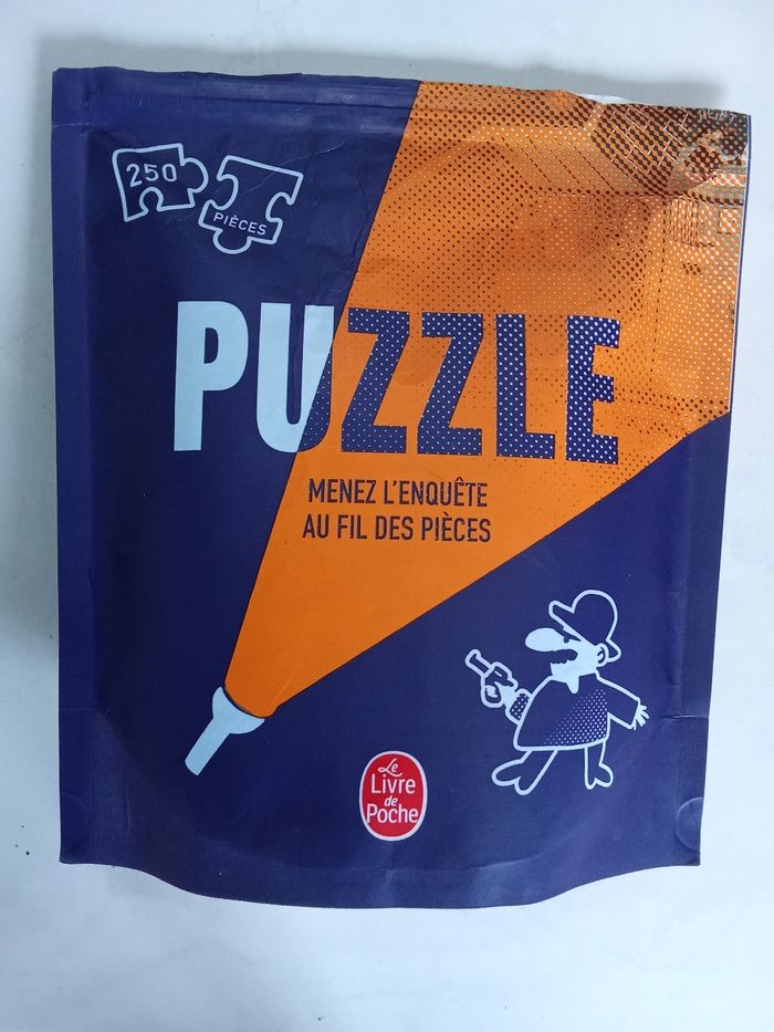 Puzzle 252 pièces "Menez l'enquête au fil des pièces"