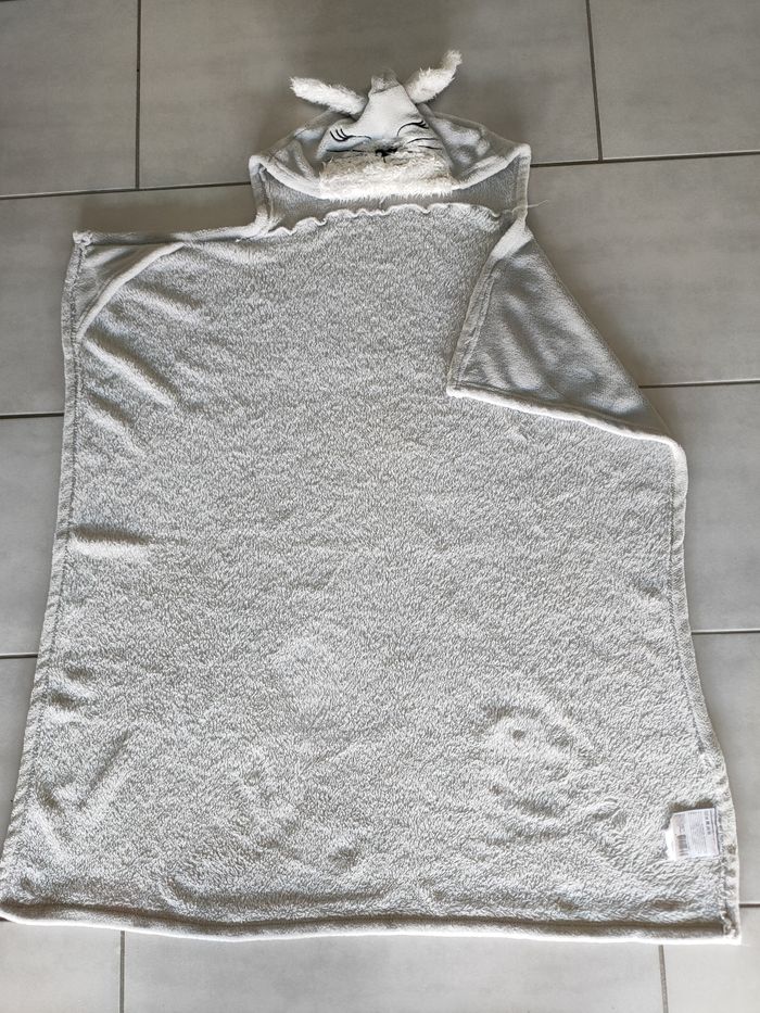 Plaid avec emplacement pour mains