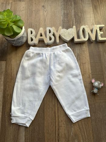 - Pantalon (F)  - 9 mois - Très bon état 