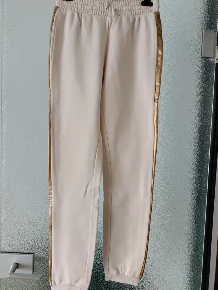 Magnifique jogging beige et doré kiabi taille XS