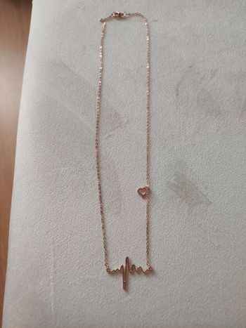 Collier battement de cœur coloris doré TBE