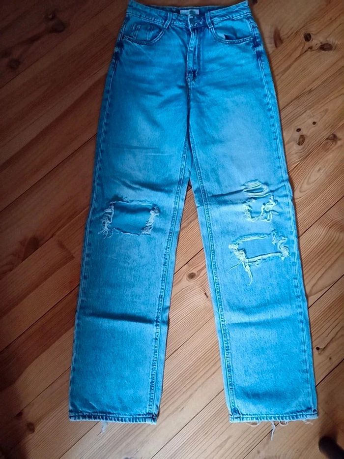 Joli Jeans style troué - Taille S 36