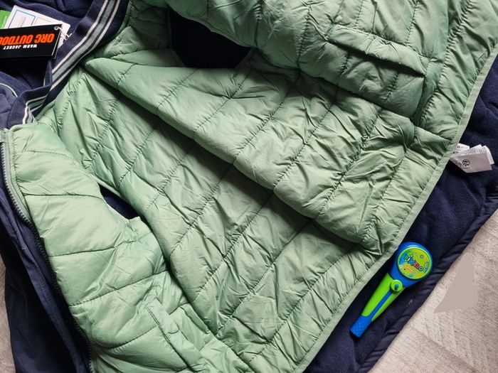 Parka et doudoune sans manches neuve 10 ans - photo numéro 4