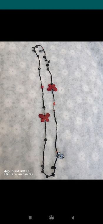 Sautoir papillon 🦋 et tête de mort