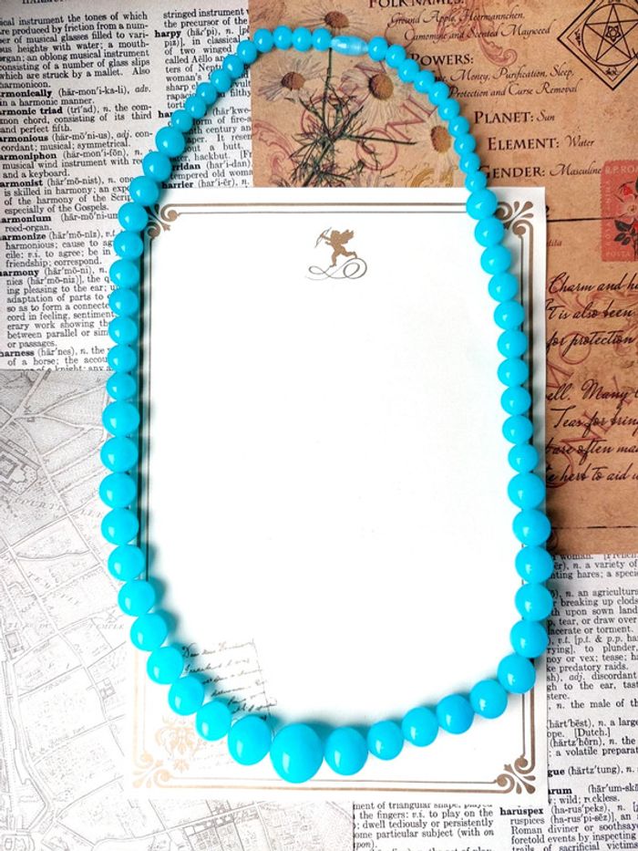Magnifique collier en perles bleues style vintage