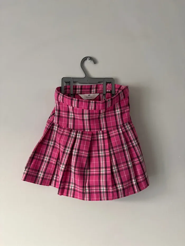 👗Jupe fille - 7 ans H&M- 128 cm - bon état - rose à carreaux