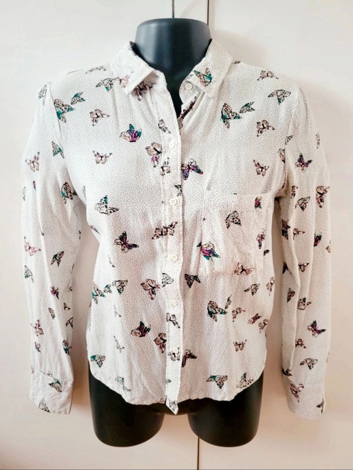Chemisier chemise coton blanche
papillon multicolores Zara taille
XS 34 - photo numéro 4