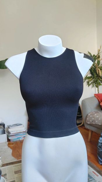 Magnifique top sans manche moulant