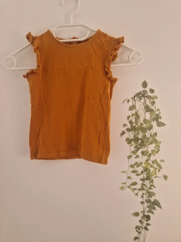 🌟 Joli haut sans manches à volants 🌟
