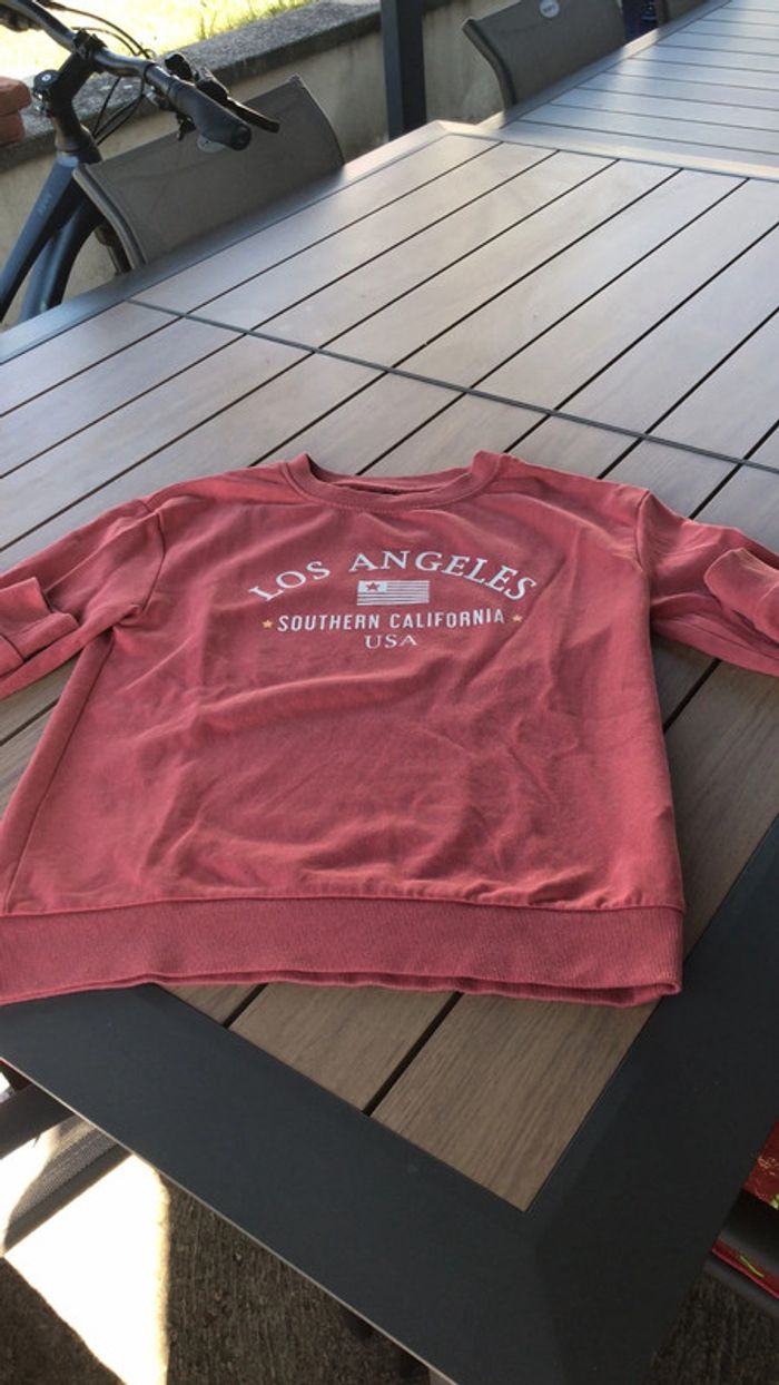 Sweat couleur corail kiabi Los Angeles taille xs