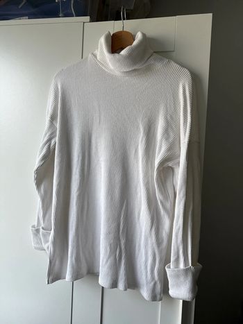 Pull long col roulé femme