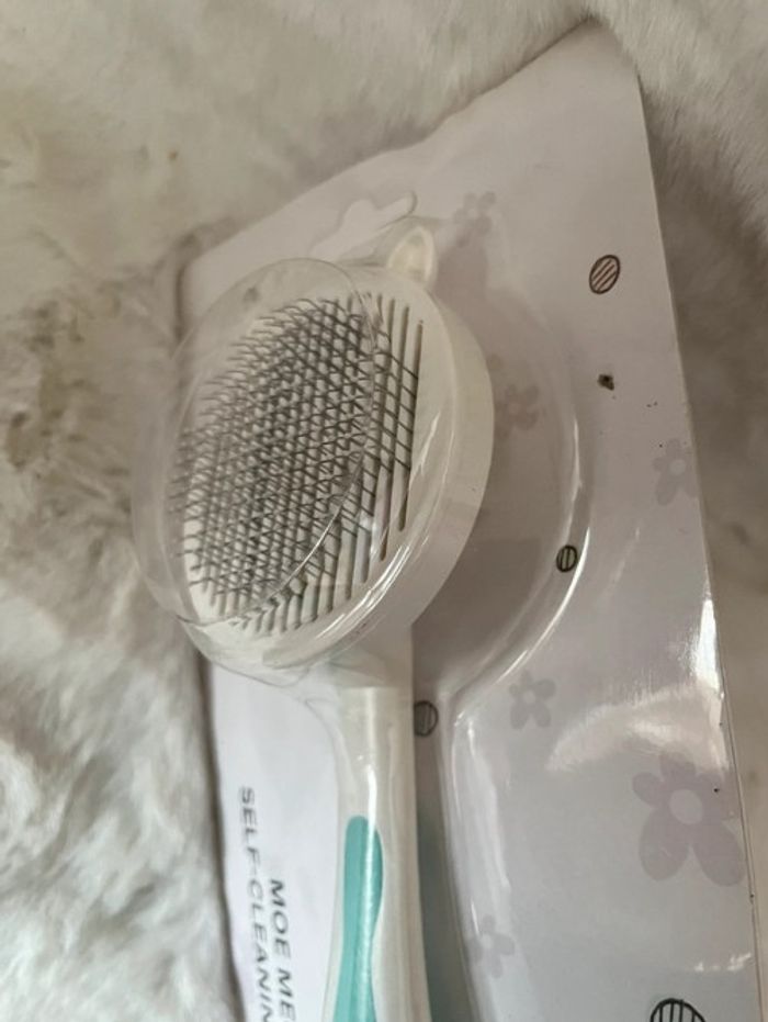 Brosse pour chat et chien autonettoyante blanche et turquoise - photo numéro 4