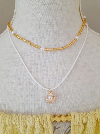 Lot 2 colliers assortis perles et coquillage
