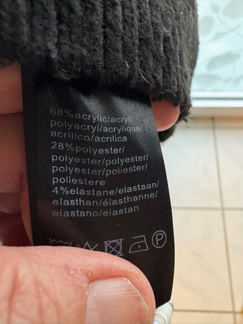 Pull noir à motifs argentés