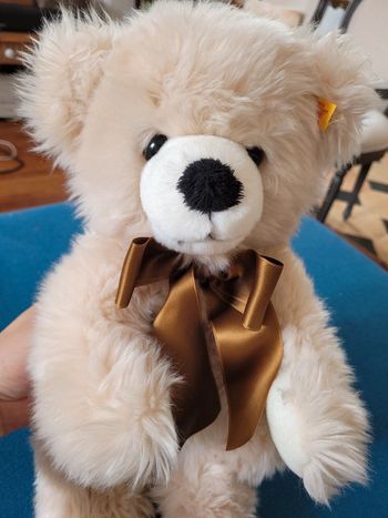 Grand Ours Steiff 42cm beige noeud marron collection peluche blanc crème clair expressif