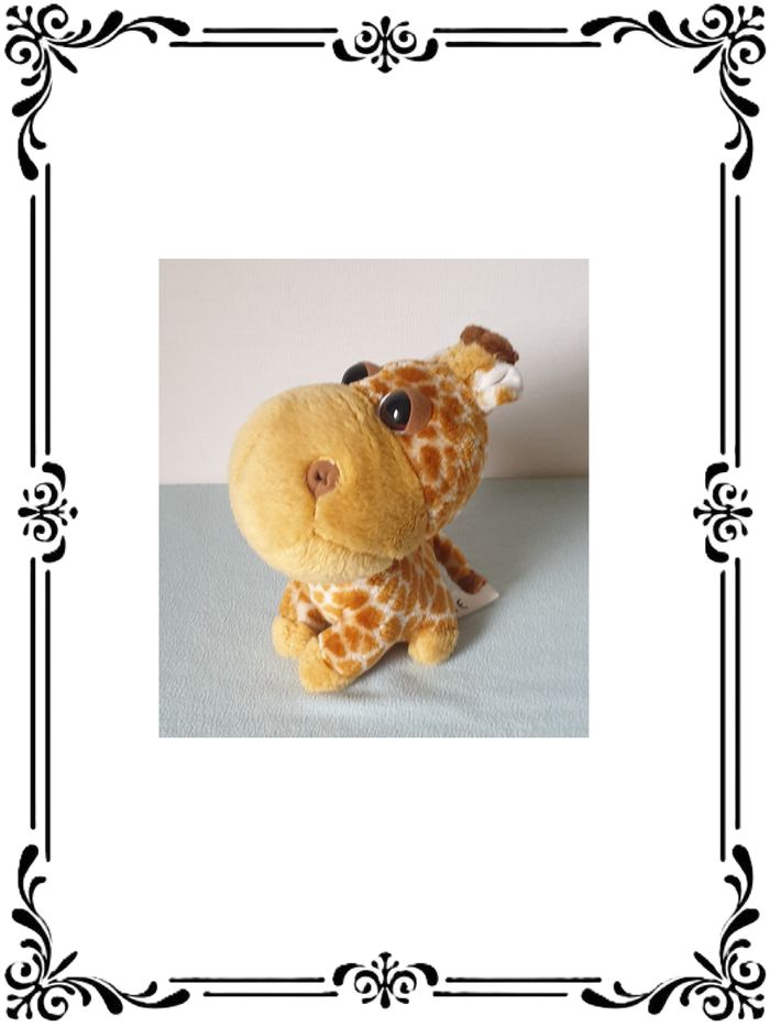 Peluche girafe.
