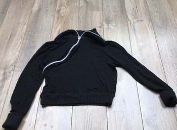 Pull noir col côtelé