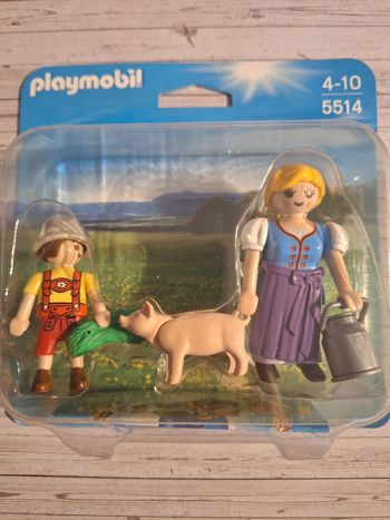 Figurine Playmobil fermière enfant et cochon