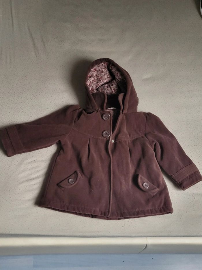 Magnifique manteau avec capuche détachable.