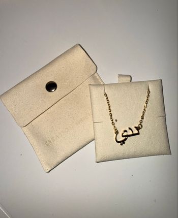 Collier écrit en arabe “ Nada ” 