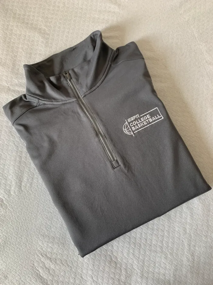 Haut de sport zippé Under Armour ESPN Collège Basketball