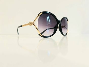 Lunette de soleil femme noire et dorée masque verres dégradés UV protection catégorie 3