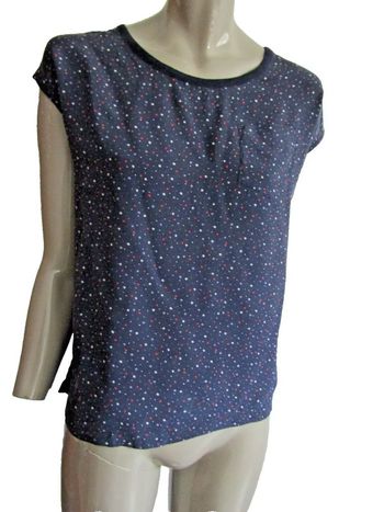 top tunique 100% soie pas de  taille indiquée mais convient a une taille 38/40