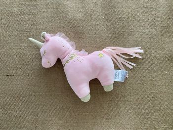 Peluche licorne rose dorée Mots d'enfants