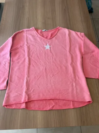 Pull rose avec étoile