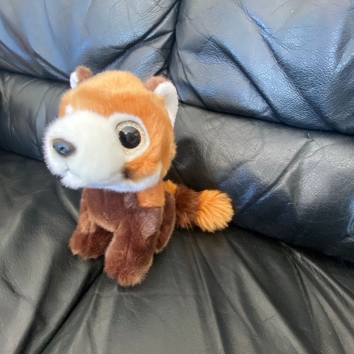 Peluche panda roux PETJES WORLD Gros yeux brillants dorés 19 cm (CEMO) - photo numéro 2