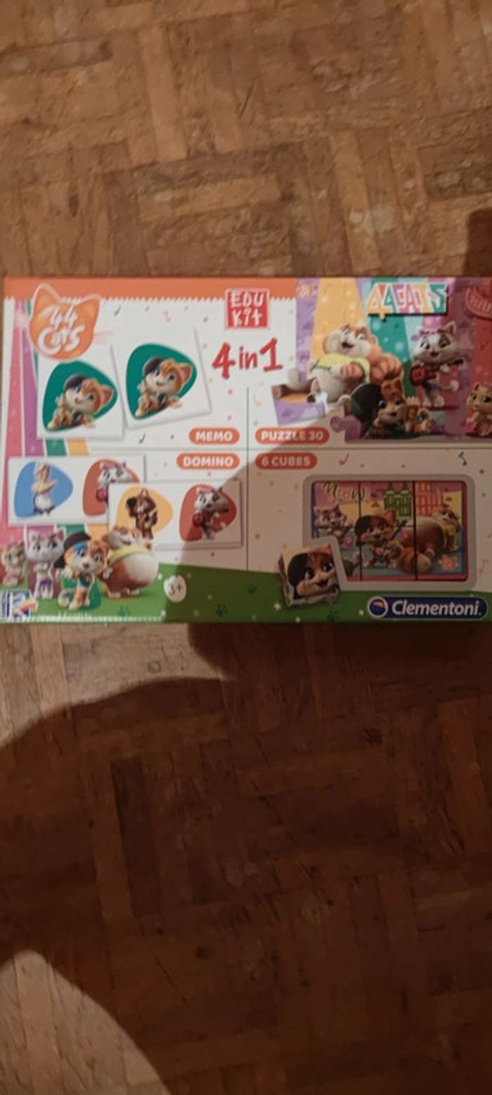 Puzzle +mémo+cubes+domino en un seul jeu neuf 3 ans