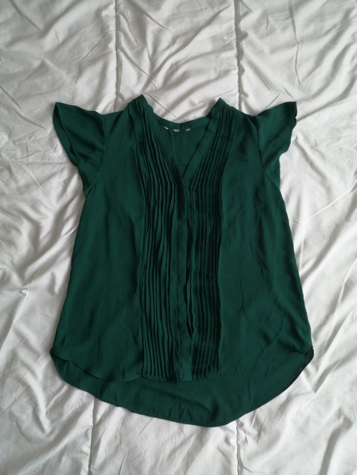 Blouse ouverte avec bouton