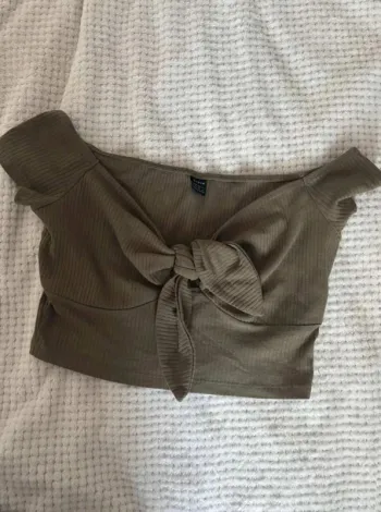Top court kaki taille 38