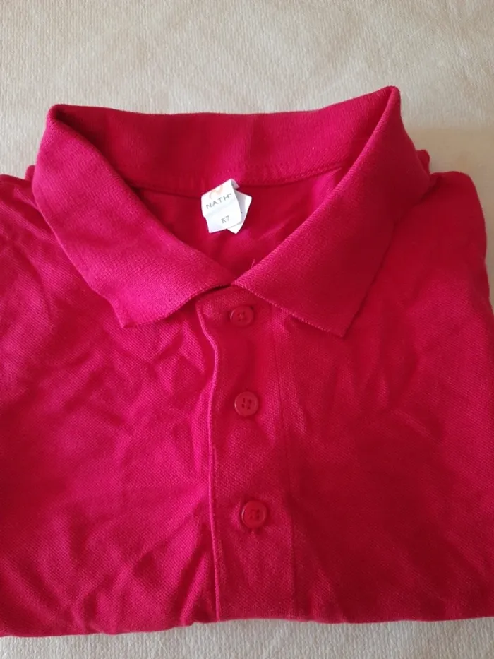 Polo manches courtes taille M. Tbe