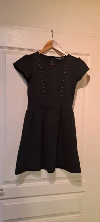 Robe hiver noire manches courtes - Marque Caprice de fille - Taille 10 ans - Très bon état.