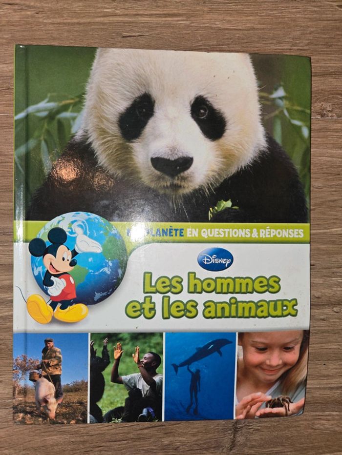 Livre Disney "Ma planète Les hommes et les animaux"