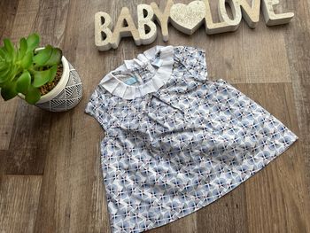 - Robe Obaibi         - 6 mois - Très bon état