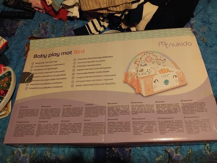 Tapis d'activité interactif avec jouets - photo numéro 2