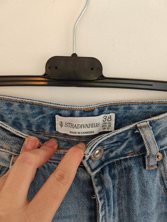 Jeans bleu troué parte éléphant Taille 38 - photo numéro 2