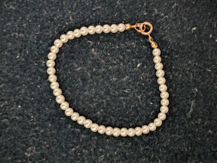 Bracelet a perles blanches - photo numéro 2