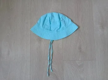 Chapeau bleu avec lanières Kimbaloo