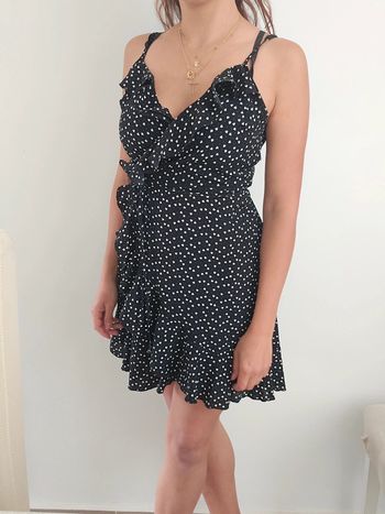 Robe cache cœur noire avec des cœurs