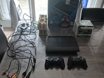 Lot console ps3 + jeux