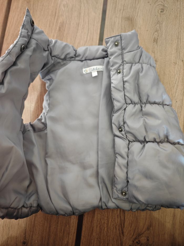 Doudoune sans manche 9 mois 
Parfait état - photo numéro 2