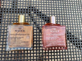 Lot de flacons neufs huile prodigieuse