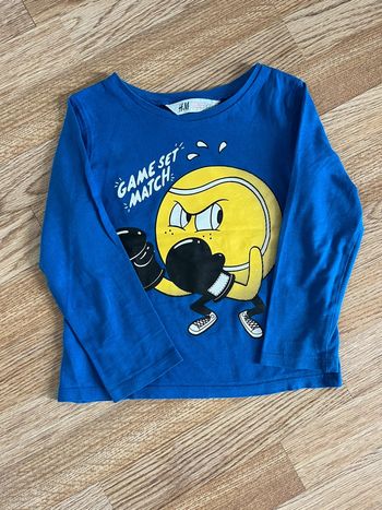 T-shirt manches longues H&M, taille 98-104 (3-4 ans).