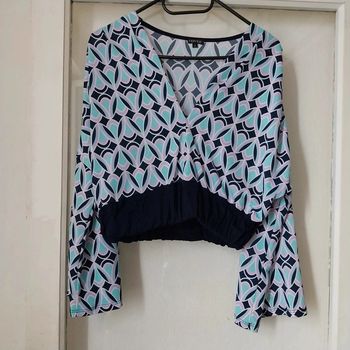 Magnifique top court taille M neuf